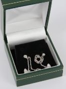 A pair of silver butterfly and floral drop earrings, stamped 925 with 925 silver butterfly backs,