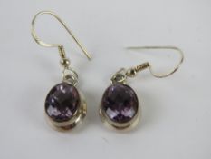 A pair of silver and amethyst earrings stamped 925.