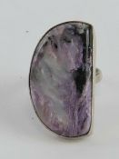 A handmade purple and black hardstone ring, the hemispherical agate approx 13 x 32mm, stamped 925,