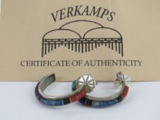 A pair of Native American half hoop earrings set with turquoise, malachite, etc,