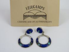 A pair of Native American earrings set with turquoise and lapis lazuli,