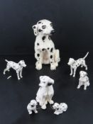 A quantity of ceramic Dalmations figurines.