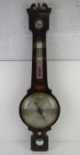 An Edwardian three glass 'banjo' barometer marked for Frankham 12 Wilson Street London.