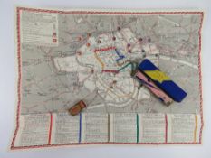 An Echo Luxe mouth organ by Hohner together with a folded presentation Coronation arrangements