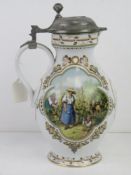 A Franklin Porcelain Rupert Schneider Weinlese design ewer with pewter lid.