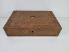 An oak canteen of cutlery having lift-out tray within, a/f, contents deficient.