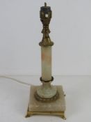 A white onyx and brass table lamp, for rewiring.