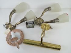 A quantity of wall light fittings including brass downlighting fitting.
