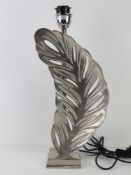 A chromed table lamp in the form of a leaf all standing 53cm high, PAT tested.