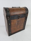 A contemporary wine storage box 28cm wide.