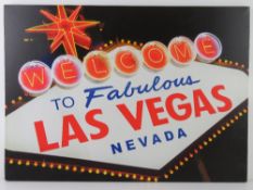 A contemporary light up canvas 'Las Vegas' 70 x 50cm, in working order at time of cataloguing.