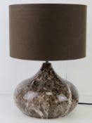 A marbled effect table lamp, with shade, PAT tested, all standing 40cm high, 28.5cm dia.