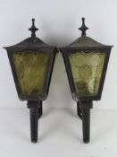 Two black painted metal and glass 'carriage' type wall lanterns a/f.