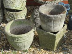 Three pre-cast stone garden planters, 19 - 26cm high.