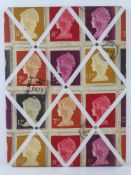 A fabric covered notice board in Victorian stamp pattern 40 x 30cm.