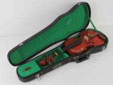 The Stentor Student 1/8 violin in hard case. Bow deficient.
