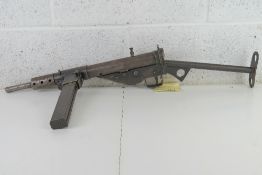 A deactivated Sten MKII with moving trig