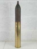 An inert WWI French shell, fuze unscrews