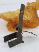 A Bren gun drum magazine adaptor.