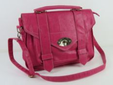 A hot pink satchel type handbag, approx