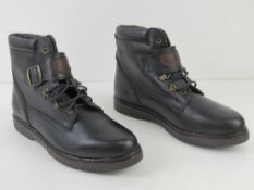 A pair of black size 5 ladies boots by '