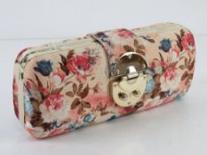 A floral fabric clutch bag, approx 24cm