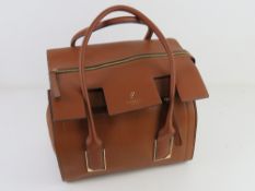 A brown leather handbag by Fiorelli appr