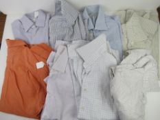 A quantity of men's shirts and polo shir