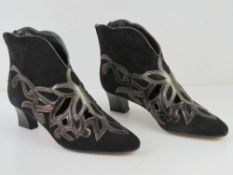 A pair of Italian made leather ankle boo