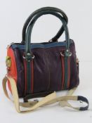 A small multicoloured handbag by Gringo