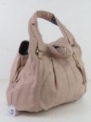 A blush pink handbag by Red Herring, app