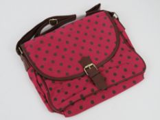 A red polka dot fabric handbag 'as new'
