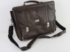A brown leather satchel/laptop bag by An