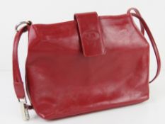 A red Italian leather handbag by Simona