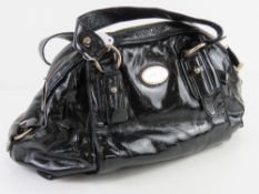 A black leather handbag by Jasper Conran