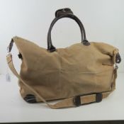 A 100% pig split leather overnight holda