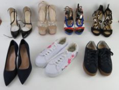 A quantity of assorted shoes inc platfor