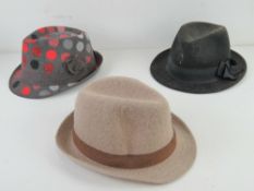 Two 100% wool Trilbys together with anot