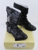 A pair of as new with labels black leath