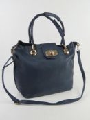 A navy blue tote bag with shoulder strap