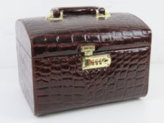 A faux crocodile skin travelling vanity