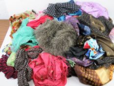 A large quantity of assorted scarves and
