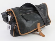 A black leather satchel type bag by Clar