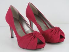A pair of hot pink peep toe Jacques Vert