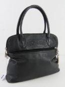 A vintage black leather handbag by Fiore