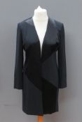 A black ladies evening jacket by Windsmo