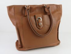 A brown leather tote bag by Debenhams ap