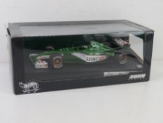 Hot Wheels 1:18 scale F1 racing car in original box; Eddie Irvine 26741.