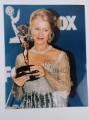A hand signed photograph of Dame Helen Mirren DBE, autograph in black pen.