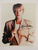 A hand signed photograph of Dame Helen Mirren DBE, autograph in black pen.